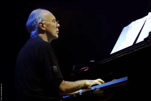 Charles Loos aan de piano